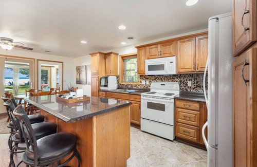 Higgins Lake House | Higgins Lake Private Beachfront Home w/Dock, Boat Mooring, Sunset & Sunrise View