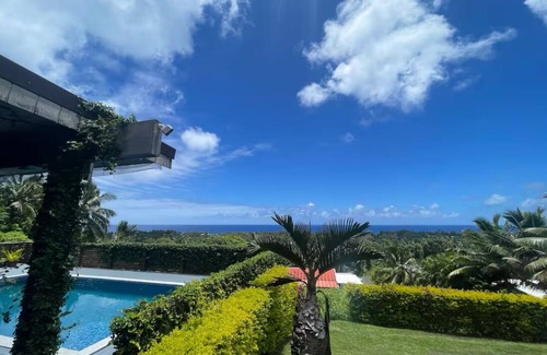 Takuvaine Tapere House | Hillside Retreat with beautiful ocean view, free unlimited Wifi, Airconditioned