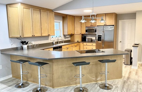 Maple City House | Hilltop Haven Down the Street from Glen Lake with lake access