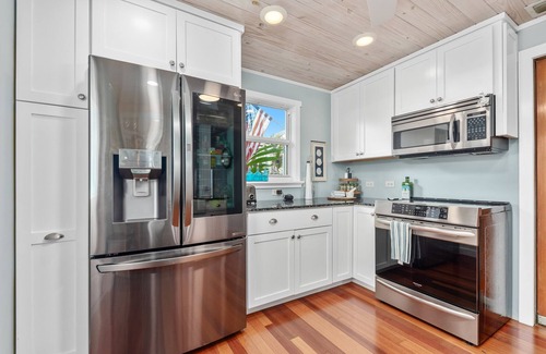 Stuart House | Historic 1935 home directly on the River! 167' New Dock, Walk to Downtown, Pool