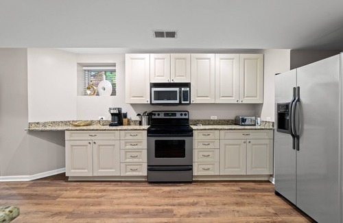Sheffield and DePaul Condo | Historic Designer Lincoln Park Retreat Sleeps 14 by AllSet Turnover