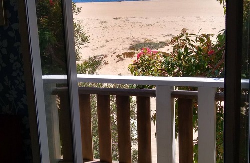 Balboa Peninsula House | Historic house with beach vibe. Sand out the front door, ocean on the horizon