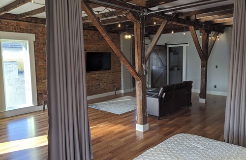 Livingston Apartment | Historic Loft with balconies.