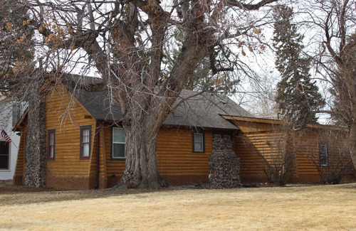 Buffalo House | Historic Log Cabin home on Main Street
