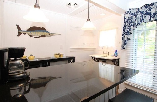 Rehoboth Beach Cabin | Historic Pines Cottage Sleeps 10 – Walk to Beach, Porch, Patio, and Charm!