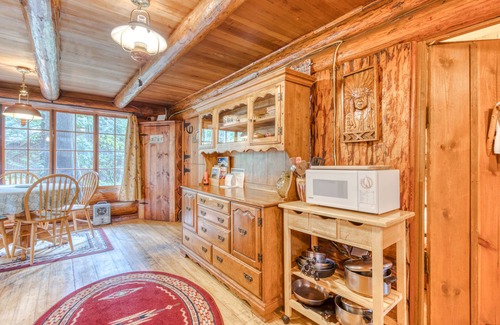 Mount Hood Village Cabin | Historic riverfront Steiner cabin in forest with firepit, deck, & patio lounging