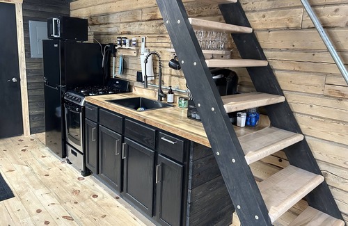 Rapid River Cabin | Historic Roots With Modern Style. Cozy cabin for your next getaway.