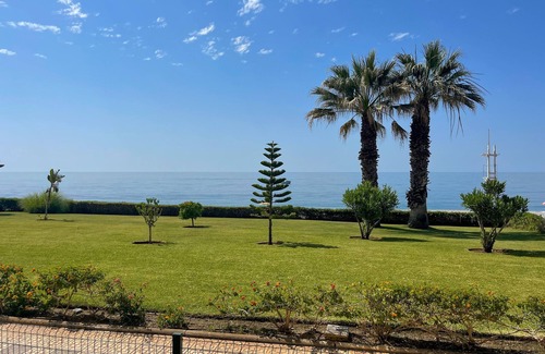 Torrox Costa Apartment | Holiday Apartment 'Casa Del Sol' close to the Beach with Sea View, Shared Garden & Wi-Fi
