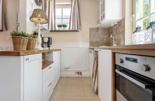 Neuenkirchen Apartment | Holiday Apartment 'Gästewohnung Am See - Maisonette' with Private Terrace and Wi-Fi Near the Beach