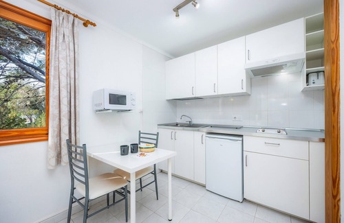 Cala Agulla Apartment | Holiday Apartment "Mhm 4" with Balcony & Wi-Fi