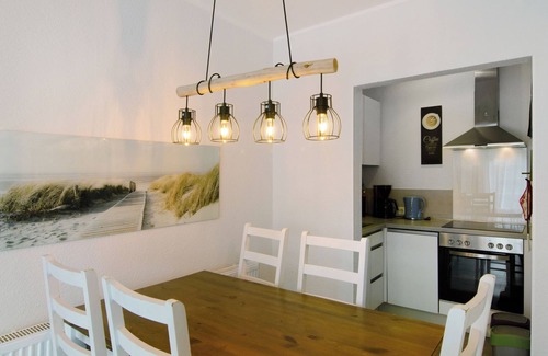 Neßmersiel Apartment | Holiday Apartment 'Ferienhaus Deichblick Nessmersiel' with Private Terrace, Private Garden and Wi-Fi