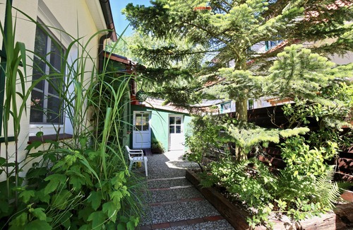 Wangerooge Apartment | Holiday Apartment 'Haus Seemumel, Fewo Unser Boot' with Private Garden and Wi-Fi