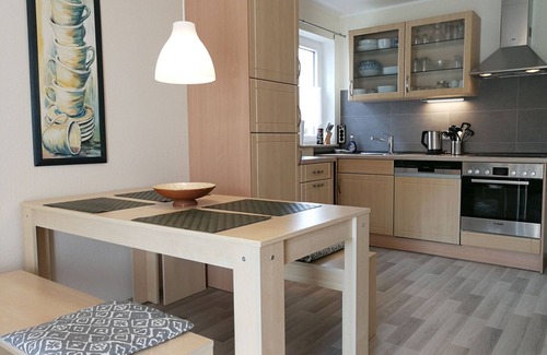 Wallersheim Apartment | Holiday Apartment 'Haus Abendsonne Hochparterre Klein' with Shared Terrace, Balcony and Wi-Fi