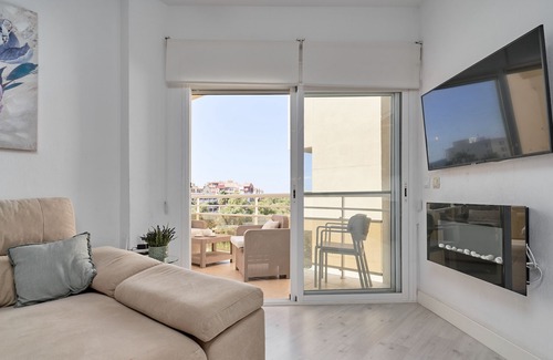 Playa Granada Apartment | Holiday Apartment "Luxury On The Beachfront" near beach with Shared Pool & Wi-Fi