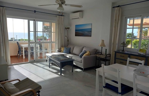 Torrox Costa Apartment | Holiday Apartment Seafront with Sea View, Covered Terrace & Wi-Fi