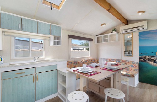 Chiclana de la Frontera House | Holiday Home 'Villa Roulotte' with Shared Pool, Shared Garden and Wi-Fi