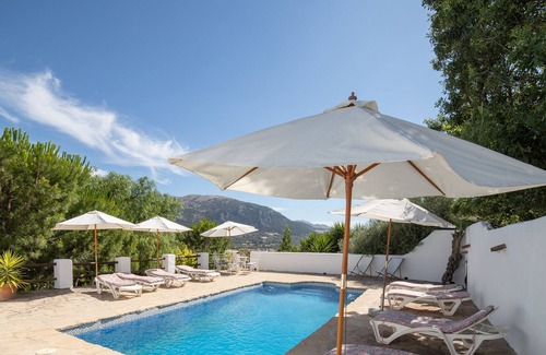 Villanueva del Trabuco Apartment | Holiday home "Cortijo Los Lobos Mountain Retreat" with communal pool and WiFi