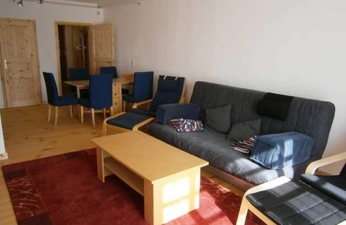 Hohenkirchen Apartment | Holiday flat in Hohenkirchen with shared pool, terrace and garden