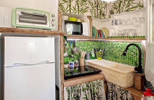 Rosignano Marittimo Villa | Holiday Home 'Vacanza nel bosco' with Shared Pool & Shared Garden
