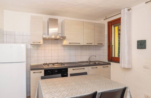 Pittulongu House | Holiday Home "Appartamento dell Pellicano" Near the Beach and with Air Conditioning