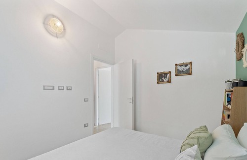 Sant'Antioco House | Holiday Home 'Aria De Domus' with Sea View, Wi-Fi and Air Conditioning