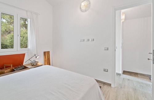Sant'Antioco House | Holiday Home 'Aria De Domus' with Sea View, Wi-Fi and Air Conditioning