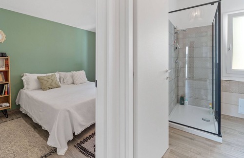 Sant'Antioco House | Holiday Home 'Aria De Domus' with Sea View, Wi-Fi and Air Conditioning