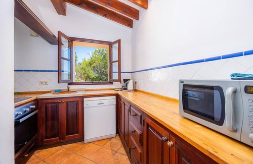 Deia House | Holiday Home 'Casita En Cala Deia Junto Al Mar 1' with Sea View, Wi-Fi and Air Conditioning