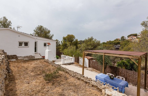 Canyelles House | Holiday Home "Casita Palmeras" with Mountain View, Private Garden & Wi-Fi