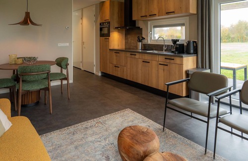 Sint Nicolaasga House | Holiday home in Sint Nicolaasga by the water