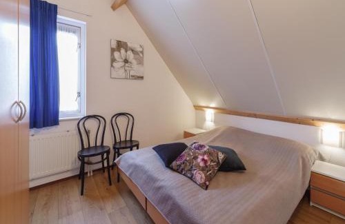 Wemeldinge House | Holiday Home in Peaceful Dutch Park with Terrace