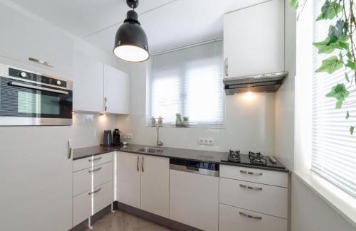 Wemeldinge House | Holiday Home in Quiet Park with Garden