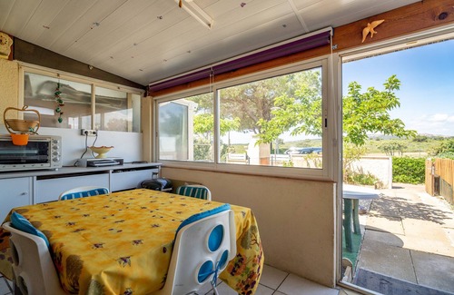 Saint-Pierre-la-Mer House | Holiday Home 'Les Eaux Vives 1' with Sea View, Shared Pool and Private Terrace