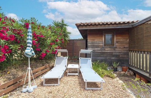 Figari House | Holiday Home 'Petite Maison' with Sea View, Private Terrace and Private Garden