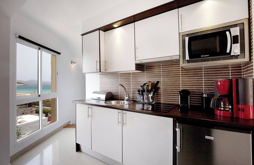 Bahia Calma Apartment | Holiday Home 'Relax & Comfort on Costa Calma' with Sea View, Shared Pool and Wi-Fi