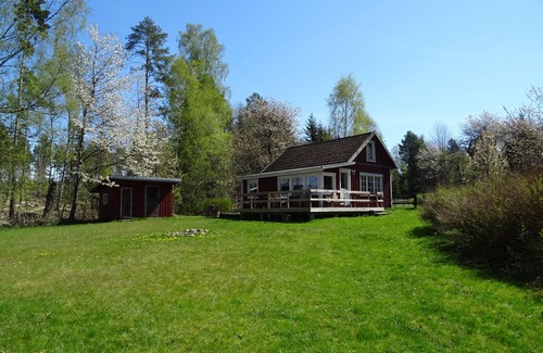 Hultsfred House | Holiday home right on the lake with a large lake property