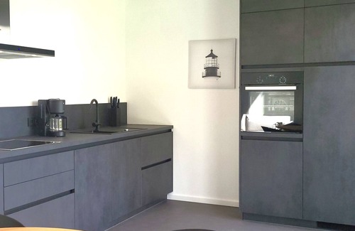 Muldestausee House | Holiday Home 'Schlossterrassen 8a' with Lake View, Private Terrace and Wi-Fi