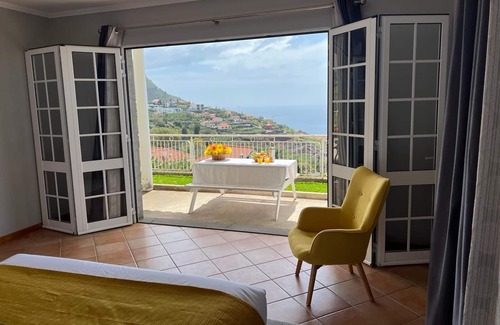 Arco da Calheta House | Holiday Home 'Spring House' with Sea View, Private Terrace and Wi-Fi