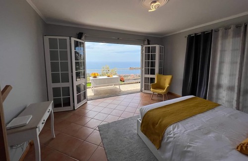 Arco da Calheta House | Holiday Home 'Spring House' with Sea View, Private Terrace and Wi-Fi