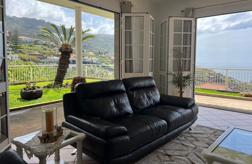 Arco da Calheta House | Holiday Home 'Spring House' with Sea View, Private Terrace and Wi-Fi