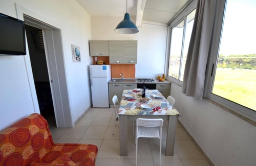 Torre dell'Orso House | Holiday Home 'Trilo Torre dell Orso 5 posti Pt33' close to the Beach
