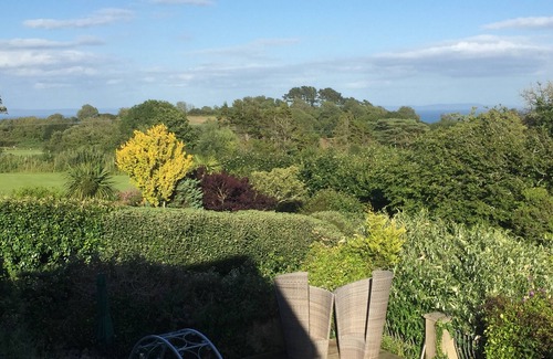 Tenby House | Holiday home with heated outdoor swimming pool May-Sept. Hot tub as extra