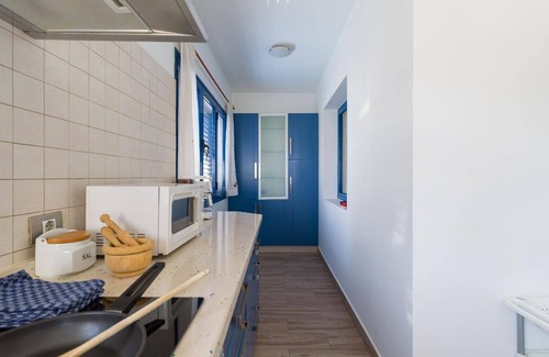 Caleta de Famara House | Holiday house Famara for 1 - 6 persons with 3 bedrooms - Row house