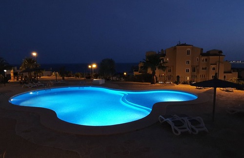 Pueblo Mascarat Apartment | Holiday Jazmines Apartment with pool and sea view