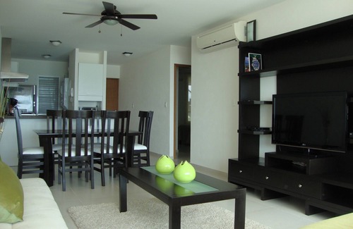 Puerto Juarez Apartment | HOME OFFICE?.ENJOY IT AT CANCUN, AFFORDABLE NICE BEACHFRONT CONDO.