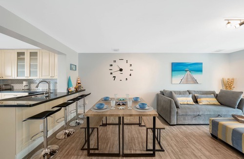 Melaleuca Gardens House | Home on Canal Unit B by PMI