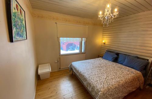 Hartola House | Home with private garden near golf, beach, fishing