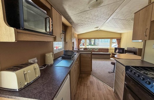 Walton on the Naze House | Homely 8 berth caravan with decking to relax on at Naze Marine, ref 17009WC