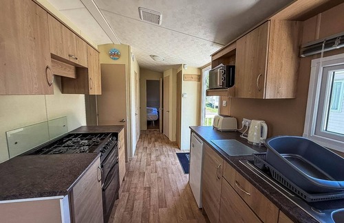 Walton on the Naze House | Homely 8 berth caravan with decking to relax on at Naze Marine, ref 17009WC