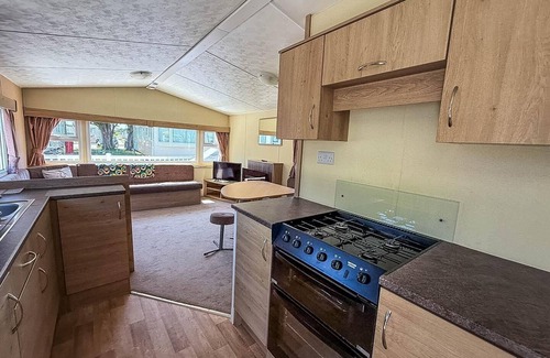 Walton on the Naze House | Homely 8 berth caravan with decking to relax on at Naze Marine, ref 17009WC